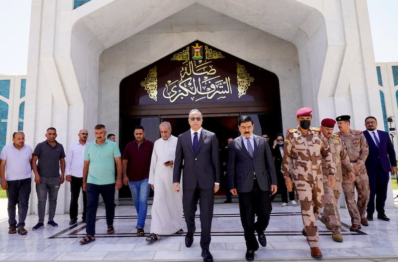 Prime Minister Mustafa Al Kadhemi and Iraqi officials arriving to take part in a ceremony at the Baghdad Airport. Photo: Iraqi Prime Minister's Office