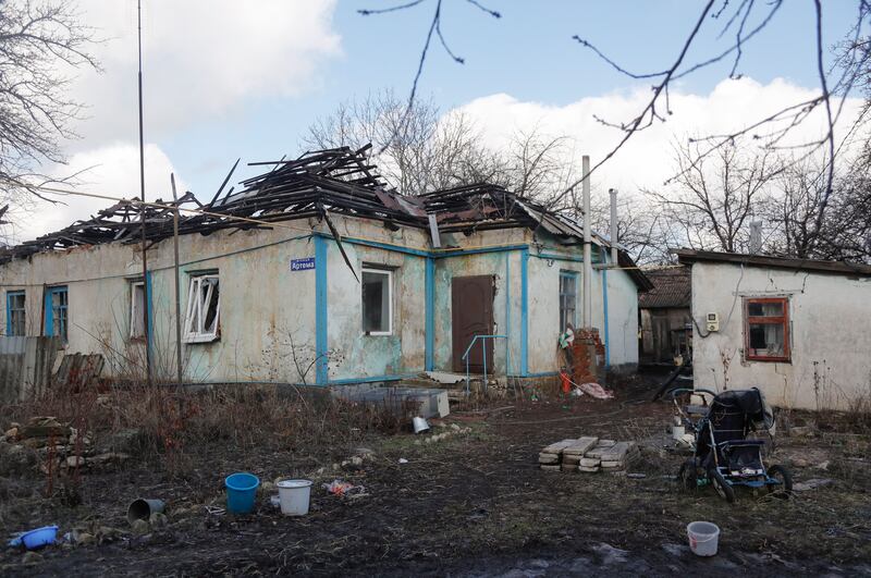 A damaged house in Vibrovka village. EPA