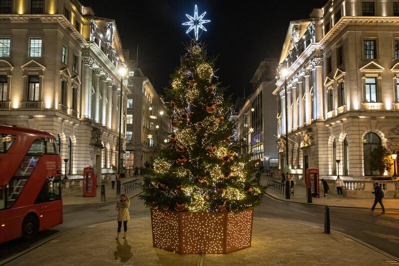 A Christmas tree is illuminated on Lower Regent Street in London, England. The United Kingdom is currently under coronavirus lockdown restrictions, with pubs, restaurants and non-essential retailers ordered to close until December 2. Getty Images