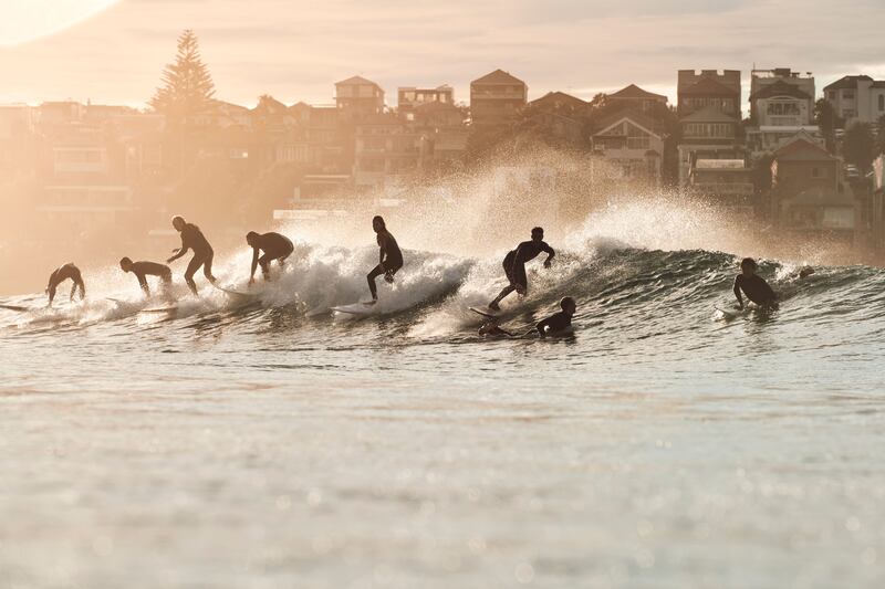 Go surfing at Bondi Beach.