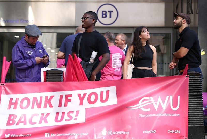 BT staff with the CWU (Communication Workers Union) stand on a picket line during a strike outside the BT Tower in London. Reuters