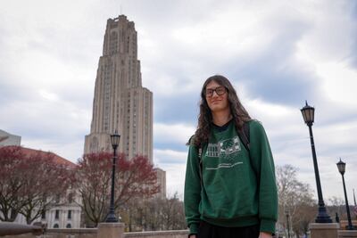 Alexandra Weiner stands in front of the Cathedral of Learning on the campus of the University of Pittsburgh