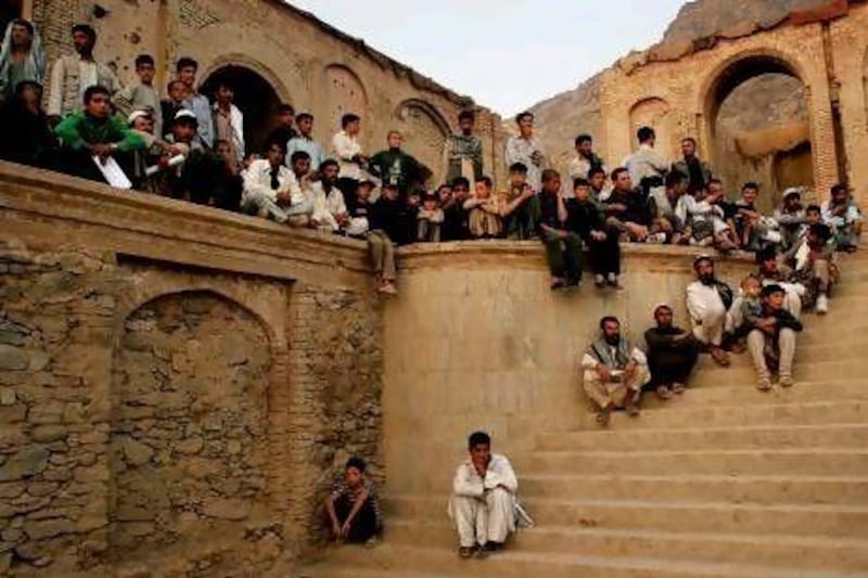 Afghans watch a performance of William Shakespeare's play Love's Labour's Lost in Kabul's Babur Garden in September 2005. AP Photo / Tomas Munita