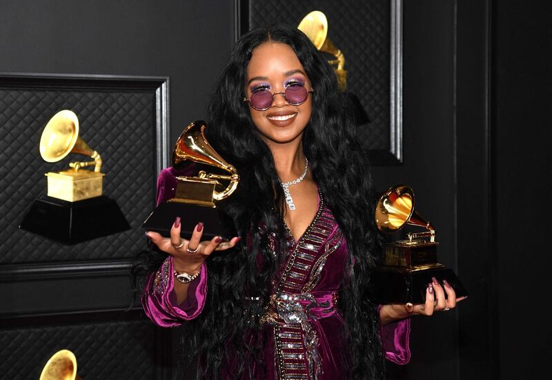 HER winner of the Best R&B Song award for 'Better Than I Imagined' and the Song of the Year award for 'I Can't Breathe' poses in the media room during the 63rd Annual Grammy Awards at Los Angeles Convention Center. AFP