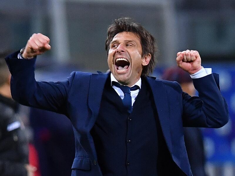 Inter Milan coach Antonio Conte celebrates after a 1-0 victory over Bologna sent Inter eight points clear at the top of Serie A. Reuters