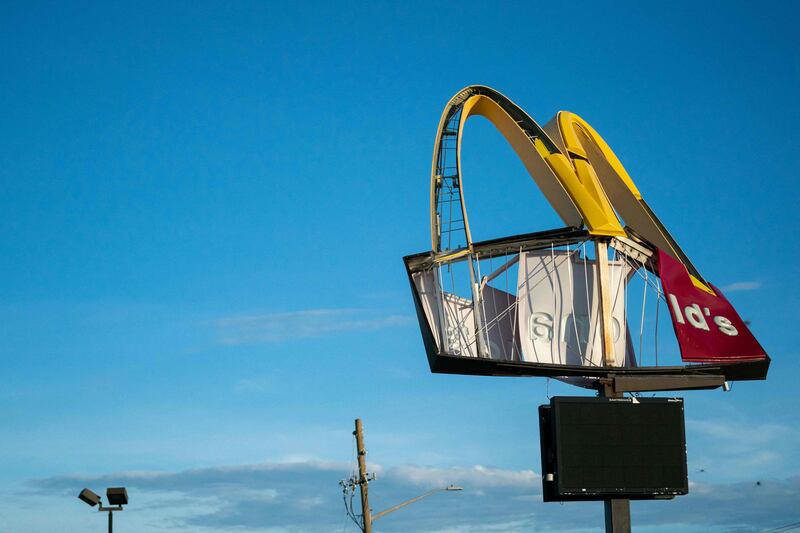 A storm-damaged McDonald's sign after Hurricane Idalia.  Getty Images
