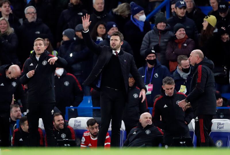 Michael Carrick on the touchline at Stamford Bridge. AFP