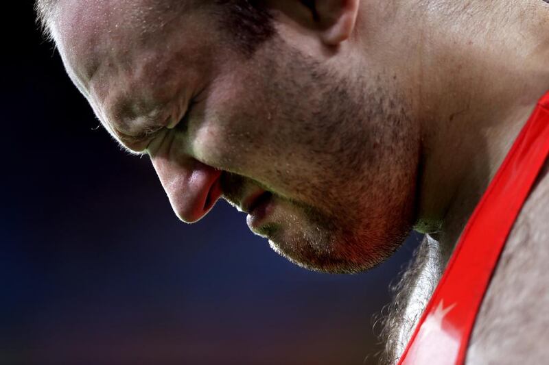 Tervel Ivaylov Dlagnev, of the United States, reacts after a semi-final loss to Komeil Nemat Ghasemi, of Iran, in a 125kg freestyle wrestling match at the 2016 Summer Olympics in Rio de Janeiro, Brazil, Saturday, August 20, 2016. Robert F Bukaty / AP Photo