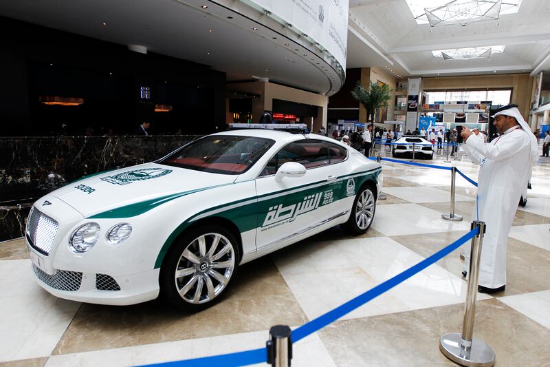 Dubai, May 6, 2013 - Dubai Police showed off their new fleet of luxury patrol cars including a Bentley Continental GT Coupe at the Arabian Travel Market at Dubai International Convention and Exhibition Centre, May 6, 2013.(Photo by: Sarah Dea/The National)

