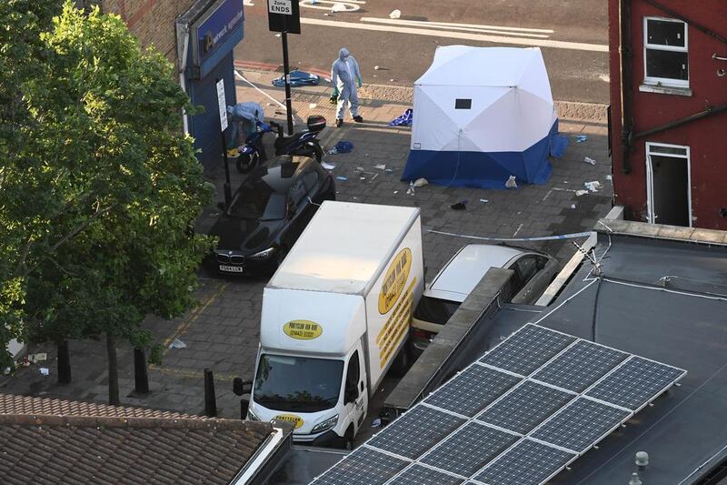 A forensics officer near Finsbury Park Mosque in London after a van ploughed into pedestrians, injuring 10. Carl Court / Getty Images