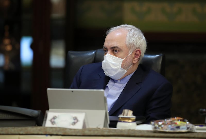A handout picture provided by the Iranian presidency on March 11, 2020 shows Iranian Foreign Minister Mohmmad Javad Zarif wearing a protective mask as a means of protection against the cornonavirus COVID-19, during a cabinet meeting in the capital Tehran. - Iran otoday reported 63 new deaths from the novel coronavirus in the past 24 hours, the highest single-day toll since it announced the first deaths from the outbreak.
The novel coronavirus outbreak in Iran is one of the deadliest outside of China and has so far killed 291 people and infected more than 8,000. (Photo by - / Iranian Presidency / AFP) / === RESTRICTED TO EDITORIAL USE - MANDATORY CREDIT "AFP PHOTO / HO / IRANIAN PRESIDENCY" - NO MARKETING NO ADVERTISING CAMPAIGNS - DISTRIBUTED AS A SERVICE TO CLIENTS ===