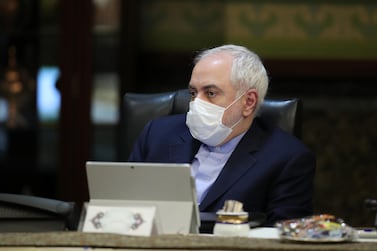 Iranian Foreign Minister Javad Zarif wears a protective mask during a cabinet meeting in the capital Tehran. AFP