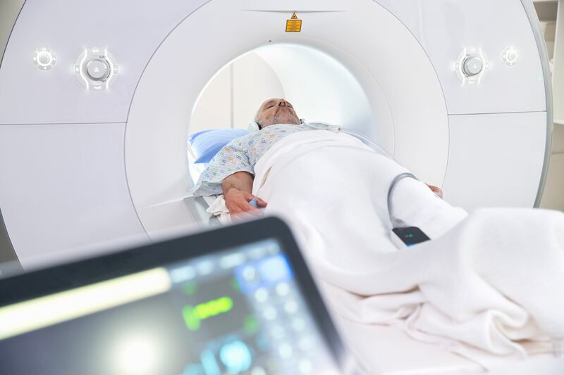 Male Patient Entering Hospital MRI Scanning Machine. Getty Images