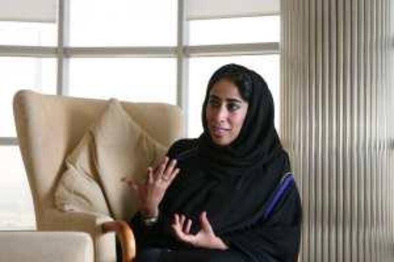 DUBAI, UNITED ARAB EMIRATES - JUNE 18:  Mona Al Marri, CEO, Brand Dubai, speaking to a National reporter at her office in Dubai, on June 18, 2009.  (Randi Sokoloff / The National) For business story by Keach Hagey.
 *** Local Caption ***  RS003-061809-MONA.jpg