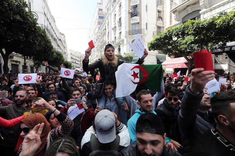 epa07392866 Algerian protesters chant slogans during a protest against the fifth term of Abdelaziz Bouteflika in Algiers, Algeria, 24 February 2019. Abdelaziz Bouteflika, serving as the president since 1999, has announced on 19 February he will be running for a fifth term in presidential elections scheduled for 18 April 2019.  EPA/MOHAMED MESSARA
