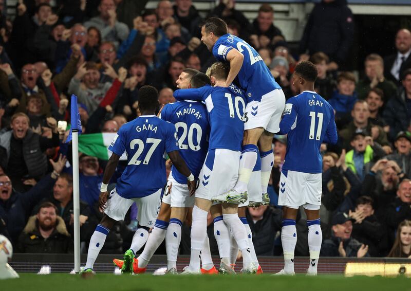 Alex Iwobi celebrates giving Everton the lead against Manchester United at Goodison on October 9, 2022. Reuters