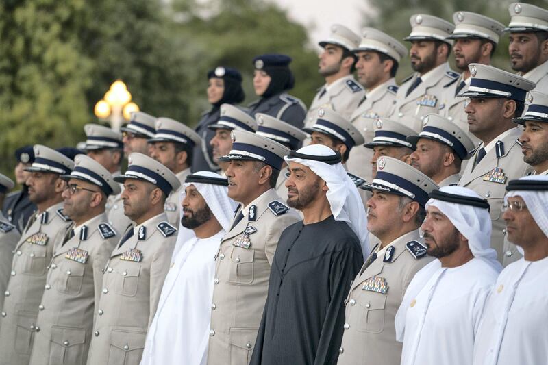 AL AIN, ABU DHABI, UNITED ARAB EMIRATES - December 04, 2017: HH Sheikh Mohamed bin Zayed Al Nahyan, Crown Prince of Abu Dhabi and Deputy Supreme Commander of the UAE Armed Forces (front row 4th R), stands for a photograph with members of Abu Dhabi Police, during a barza, at Al Maqam Palace. Seen with HE Brigadier Maktoum Ali Al Sharifi, Acting Director General of Abu Dhabi Police (front row 3rd R) and HE Major General Mohamed Khalfan Al Romaithi, Commander in Chief of Abu Dhabi Police and Abu Dhabi Executive Council Member (front row 5th R).

( Mohamed Al Hammadi / Crown Prince Court - Abu Dhabi )
---