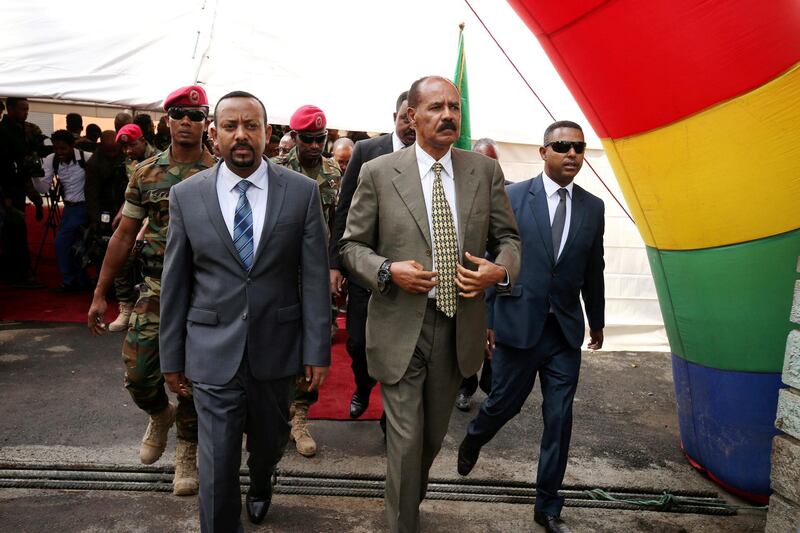 FILE PHOTO: Eritrea's President Isaias Afwerki and Ethiopia's Prime Minister, Abiy Ahmed arrive for an inauguration ceremony marking the reopening of the Eritrean embassy in Addis Ababa, Ethiopia July 16, 2018.  REUTERS/Tiksa Negeri/File Photo