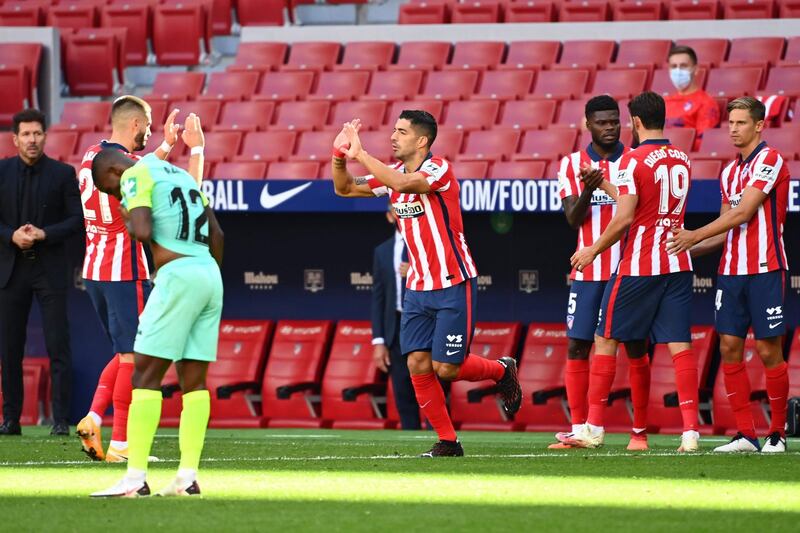 Luis Suarez enters the pitch for his Atletico Madrid debut. AFP