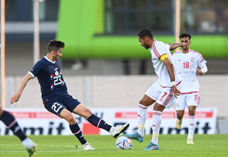 Ali Mabkhout and Mathias Villasanti challenge for the ball. Photo: UAE FA