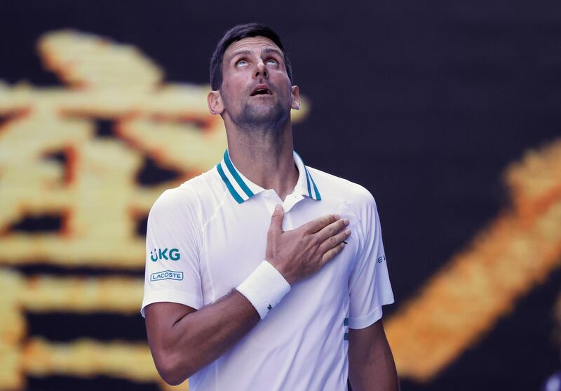 Serbia's Novak Djokovic celebrates after defeating United States' Frances Tiafoe in their second round match at the Australian Open tennis championship in Melbourne, Australia, Wednesday, Feb. 10, 2021.(AP Photo/Rick Rycroft)