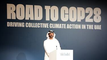 Abdulla Bin Touq, Minister of Economy, speaks during a Road to Cop28 event held in Dubai this week. Pawan Singh / The National