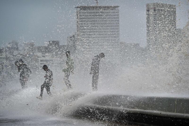 TV footage has shown gridlock across Mumbai as the roads were flooded. AFP