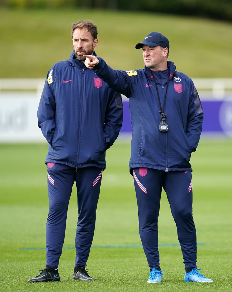 England manager Gareth Southgate, left, and assistant Steve Holland. PA