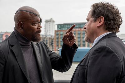 This image released by Sony Pictures shows Samuel L. Jackson, left, and Jon Favreau in a scene from "Spider-Man: Far From Home." (Jay Maidment/Columbia Pictures/Sony via AP)