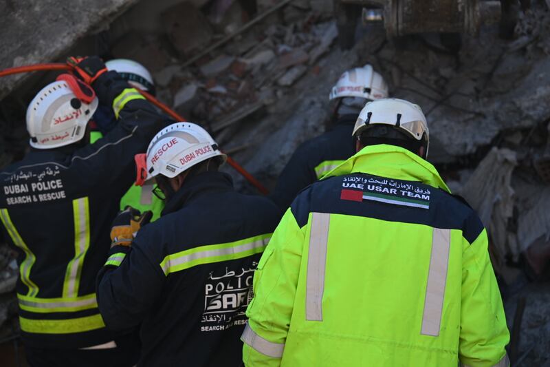The Emirati search and rescue teams are assisting in finding people trapped beneath the rubble