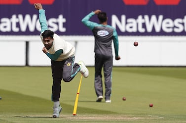 Pakistan's Mohammad Amir (L) bowls during a practice session at Lord's Cricket Ground in London on May 23, 2018, on the eve of the first Test match between England and Pakistan. / AFP / Adrian DENNIS