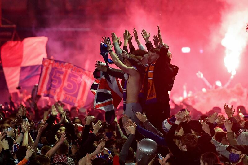Rangers fans gather in George Square in Glasgow to celebrate the club winning the Scottish Premiership for the first time in 10 years. Getty