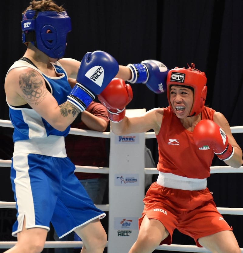 Mary Kom, in red, lost to Nazym Kyzaibay in the Asian Championships flyweight final at the Le Meridien Grand Ballroom in Dubai on Sunday, May 30, 2021.