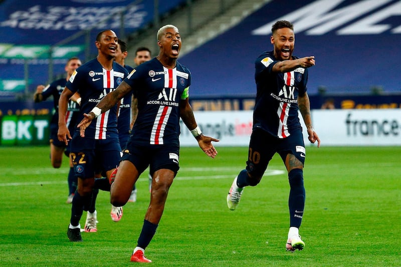 Neymar , right, defender Presnel Kimpembe and teammates celebrate. AFP