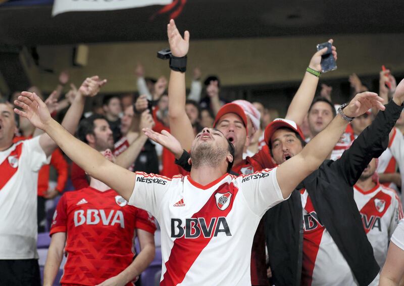 Al Ain, United Arab Emirates - December 18, 2018: River Plate fans go mental during the game between Espérance de Tunis and Guadalajara in the Fifa Club World Cup. Tuesday the 18th of December 2018 at the Hazza Bin Zayed Stadium, Al Ain. Chris Whiteoak / The National