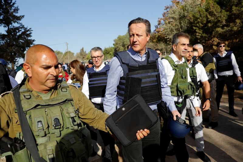 British Foreign Secretary David Cameron and Israeli Foreign Minister Eli Cohen visit Kibbutz Beeri following the October 7 deadly attack by Hamas. Reuters