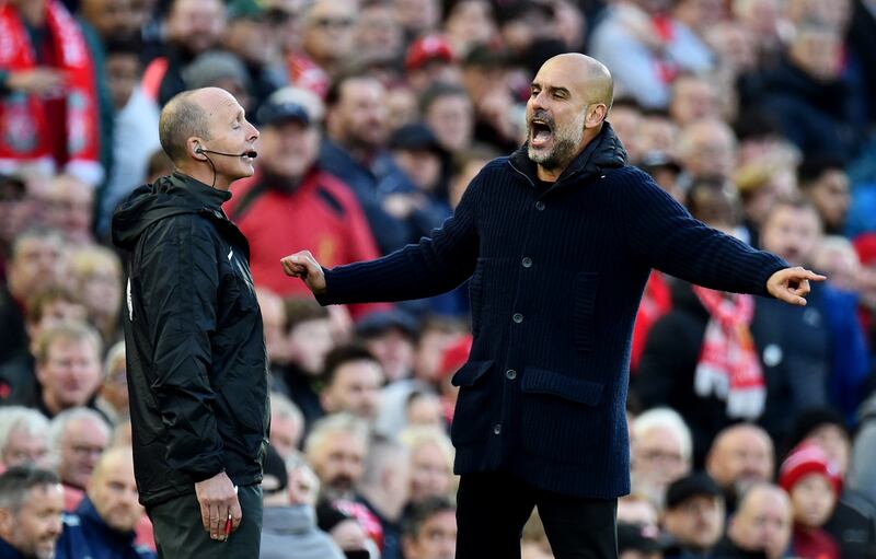 City manager Pep Guardiola remonstrates with the fourth official. Reuters