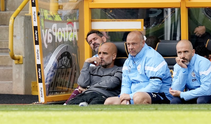 Manchester City manager Pep Guardiola watches from the bench. EPA