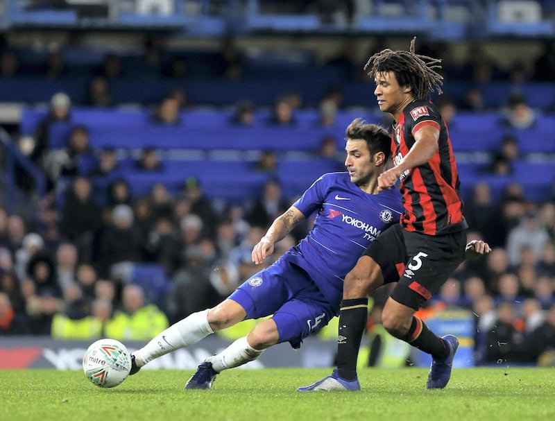 LONDON, ENGLAND - DECEMBER 19: Cesc Fabregas of Chelsea FC and Nathan Ake of AFC Bournemouth in action during the Carabao Cup Quarter Final match between Chelsea FC and AFC Bournemouth at Stamford Bridge on December 19, 2018 in London, United Kingdom. (Photo by Chloe Knott - Danehouse/Getty Images)