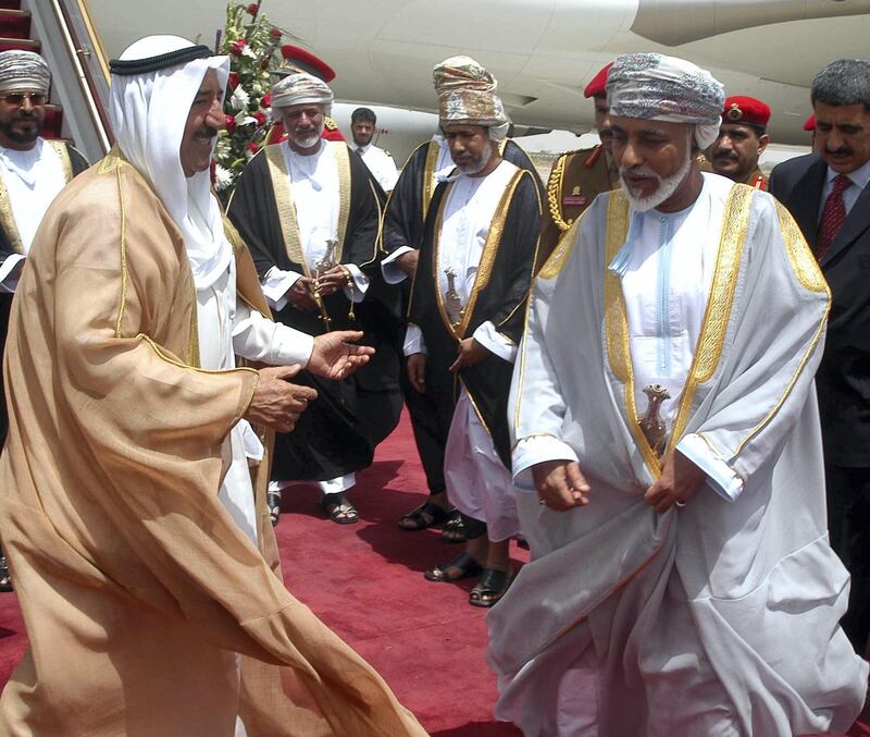 Kuwaiti Prime Minister Sheikh Sabah al-Ahmad al-Sabah (L) welcomes Sultan Qaboos bin Saeed of Oman (R) upon his arrival to Kuwait City 07 June 2005 for a three-day official visit to the state. Qaboos will hold official talks with His Highness the Prime Minister Sheikh Sabah Al-Ahmad Al-Jaber Al-Sabah.  AFP PHOTO/YASSER AL-ZAYYAT (Photo by YASSER AL-ZAYYAT / AFP)