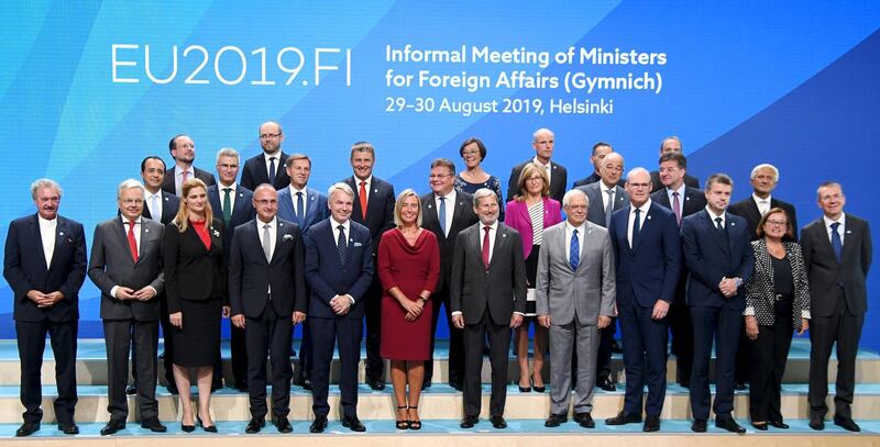 Participants in the Informal Meeting of the EU Foreign Ministers pose for the family photo in Helsinki, Finland on August 29, 2019.  / AFP / Lehtikuva / Jussi Nukari
