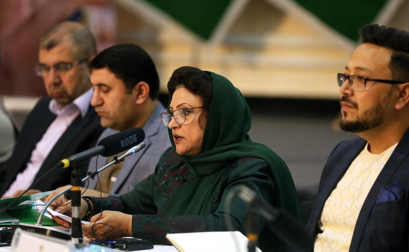 epa07934251 Hawa Alam Nuristani (2-R) head of the Independent Election Commission of Afghanistan (IEC) talks with journalists during a press conference in Kabul, Afghanistan, 19 October 2019. The head of the IEC said that due to the technical issues we could not announced the preliminary result of the 28th September presidential election according to the deadline, therefore, we apologize from the people of Afghanistan promising that in the upcoming days they will announce the result.  EPA/JAWAD JALALI