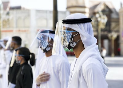 DUBAI, UNITED ARAB EMIRATES. 25 OCTOBER 2020. 
Checkers line up at the entrance of Global Village. GV celebrates it’s 25th season this year.
(Photo: Reem Mohammed/The National)

Reporter:
Section: