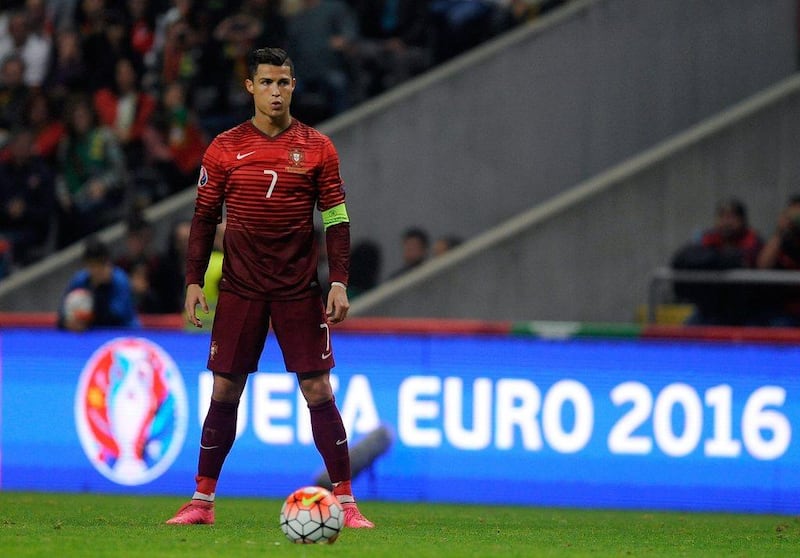 Portugal’s Cristiano Ronaldo lines up a free kick during a Euro 2016 qualifying match against Denmark last Thursday. Paulo Duarte / AP / October 8, 2015 