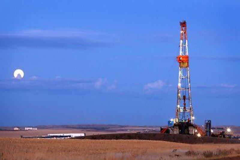 An oil drilling rig stands in Watford City, North Dakota, on the Bakken formation, which is estimated to contain 4.3 billion barrels of oil. Bloomberg News