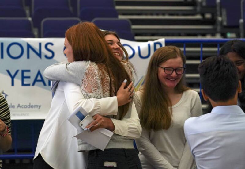 Pupils at Aylesbury Vale Academy in Buckinghamshire celebrate after getting their GCSE results.