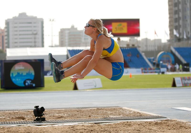 Yuliia Pavlenko of Ukraine in action during the Women's Long Jump T11. EPA