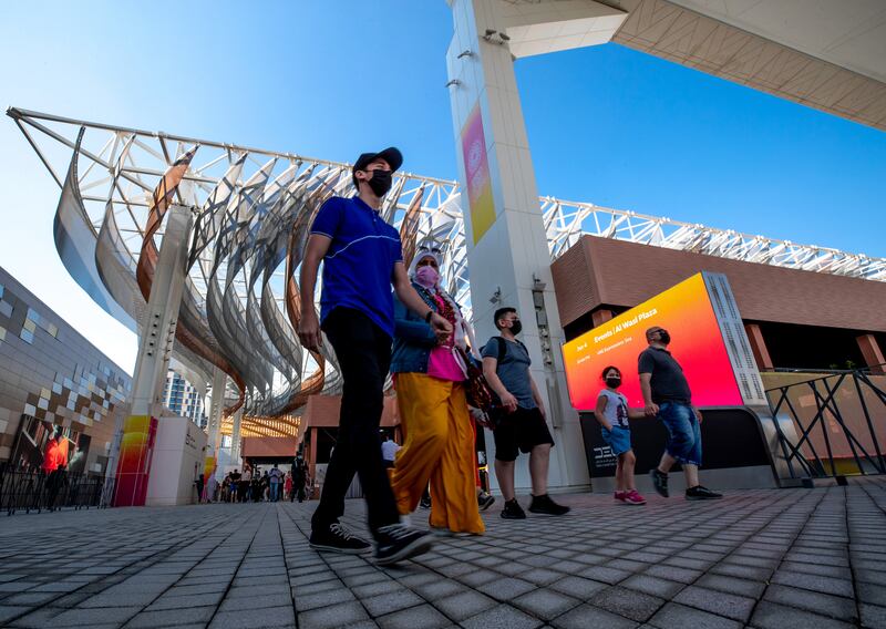 Expo 2020 Dubai visitors are still arriving to enjoy the world's fair, where safety measures have been put in place to protect against the Omicron variant. Victor Besa / The National