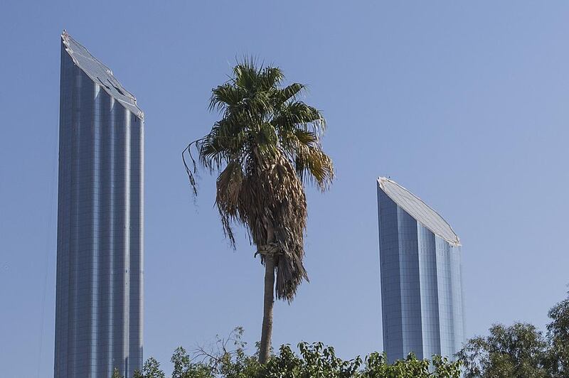 The Burj Mohammed bin Rashid tower, left, is the tallest building in Abu Dhabi. Mona Al Marzooqi / The National