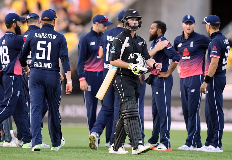 Cricket - ODI - New Zealand v England - Wellington Regional Stadium, Wellington, New Zealand - March 3, 2018 - England players celebrate as New Zealand's Colin Munro walks off the ground after being dismissed during their one-day international match.   REUTERS/Ross Setford